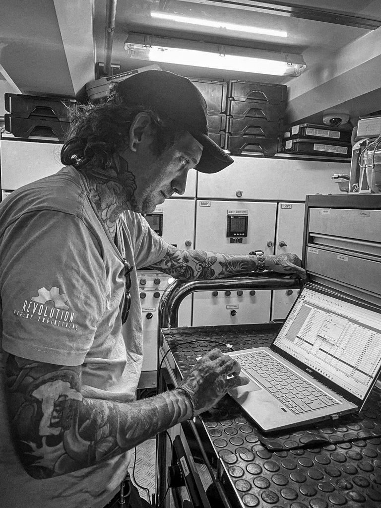 Revolution Marine Engineering Matt working on analytics